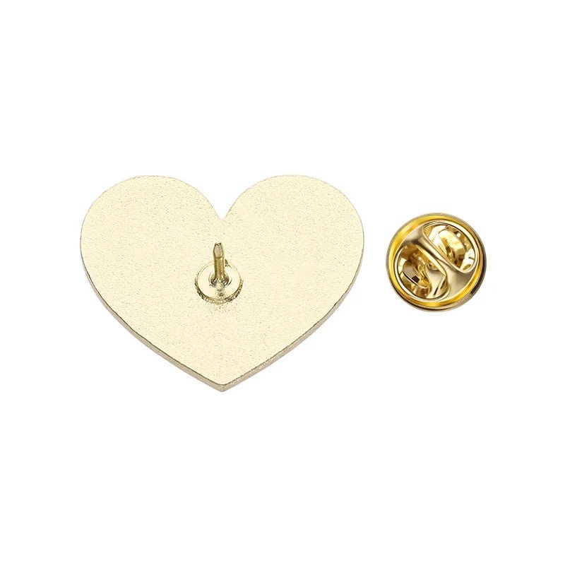 Gold heart-shaped lapel pin features a butterfly clutch backing and a smooth, flat surface that pairs well with red and gold enamel pins. Its centered post allows easy attachment to fabric.