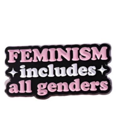 The My Cutesy Era sign features FEMINISM in pink and white letters on a black background, celebrating strong women and all genders, with two sparkling star icons beside the word includes.