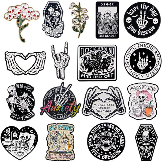 Kiss Me Later offers a quirky gothic sticker set featuring skeletons, flowers, skulls, thick thighs art, and positive sayings like Work Ethic Takes Talent, Spooky Vibes, and No Panic All Disco.