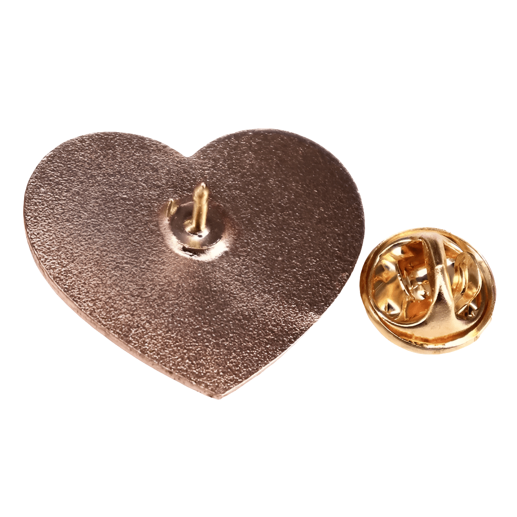 A My Cutesy Era love heart enamel pin with a textured metal finish is shown next to its gold-colored butterfly clutch backing, which is detached and placed beside it.