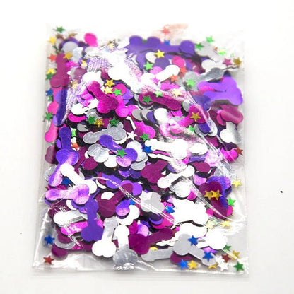 A clear Kiss Me Later plastic bag filled with metallic penis-shaped confetti in purple, pink, and silver, plus small multicolored stars—perfect adult party decor—displayed on a white background.
