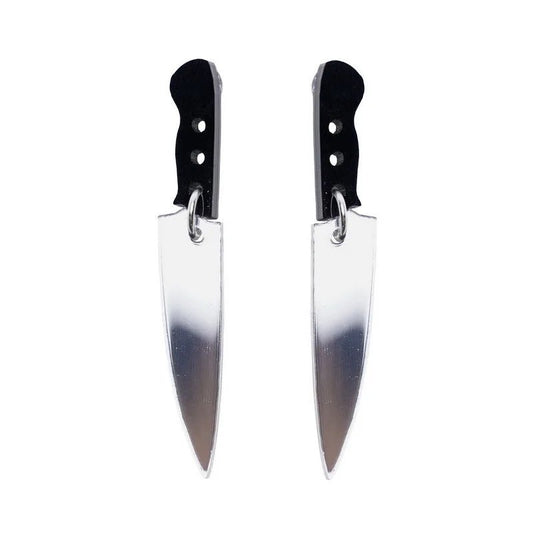 Kiss Me Later knife earrings feature kitchen knife shapes with black handles and silver blades, crafted from acrylic charms and shown side by side on a white background.