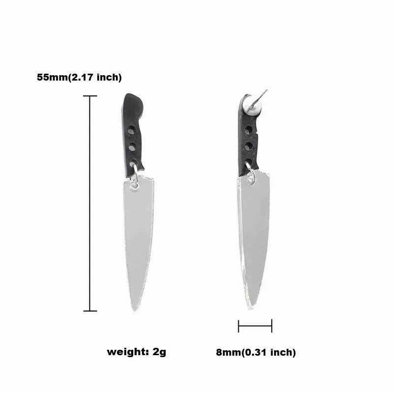 Two knife earrings by Kiss Me Later feature black handles, silver blades, and acrylic knife charms. Each earring measures 55mm long, 8mm wide, and weighs 2g.