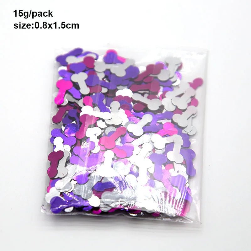 A clear plastic bag from Kiss Me Later holds 15g of colourful metallic penis-shaped confetti in pink, purple, and silver (size: 0.8x1.5cm).