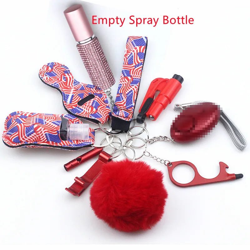 The Kiss Me Later keychain set includes personal safety items: an empty spray bottle, alarm, whistle, pom-pom, touch tool, and stylish fabric holders with metal rings—ideal for outdoor use. Text on item: Empty Spray Bottle.