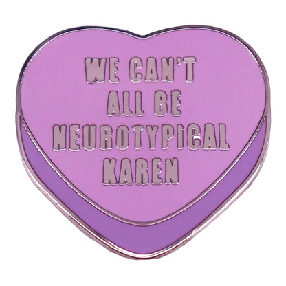 Kitsch enamel pin features a pink love heart on a purple background with the words WE CANT ALL BE NEUROTYPICAL KAREN in silver capital letters.