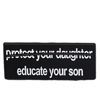 A black rectangular sign by My Cutesy Era, ideal for enamel pin collectors and feminists, features protect your daughter crossed out with educate your son in bold white—an empowering message for strong women.