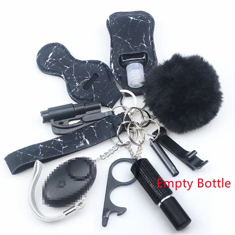 The Kiss Me Later black marble keychain set includes a pom-pom, alarm, whistle, touch tool, flashlight, and key rings—perfect for outdoors. “Empty Bottle” is shown in red text next to the small bottle holder.