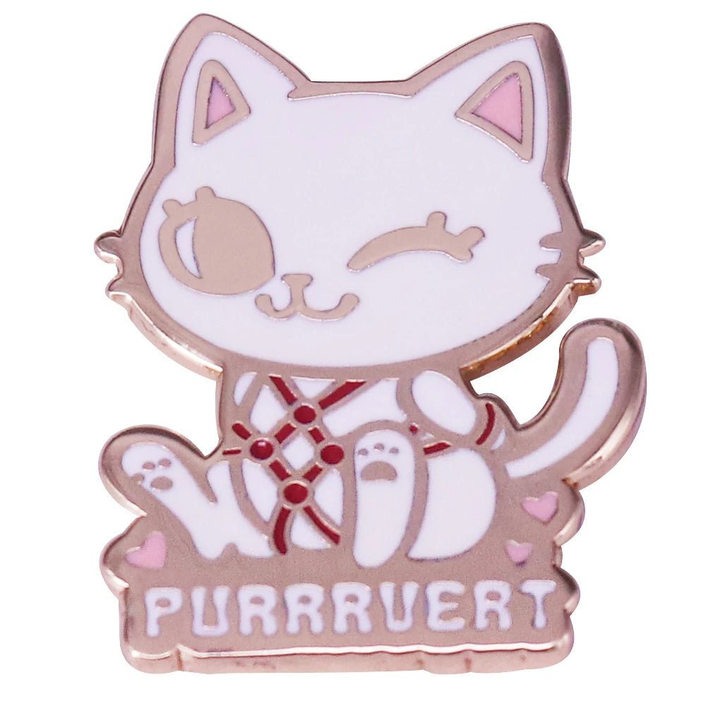 Cat enamel pin features a cream cartoon cat with a winking face and red rope harness, plus PURRRVERT below—perfect as a playful bondage-themed accessory for cat lovers.