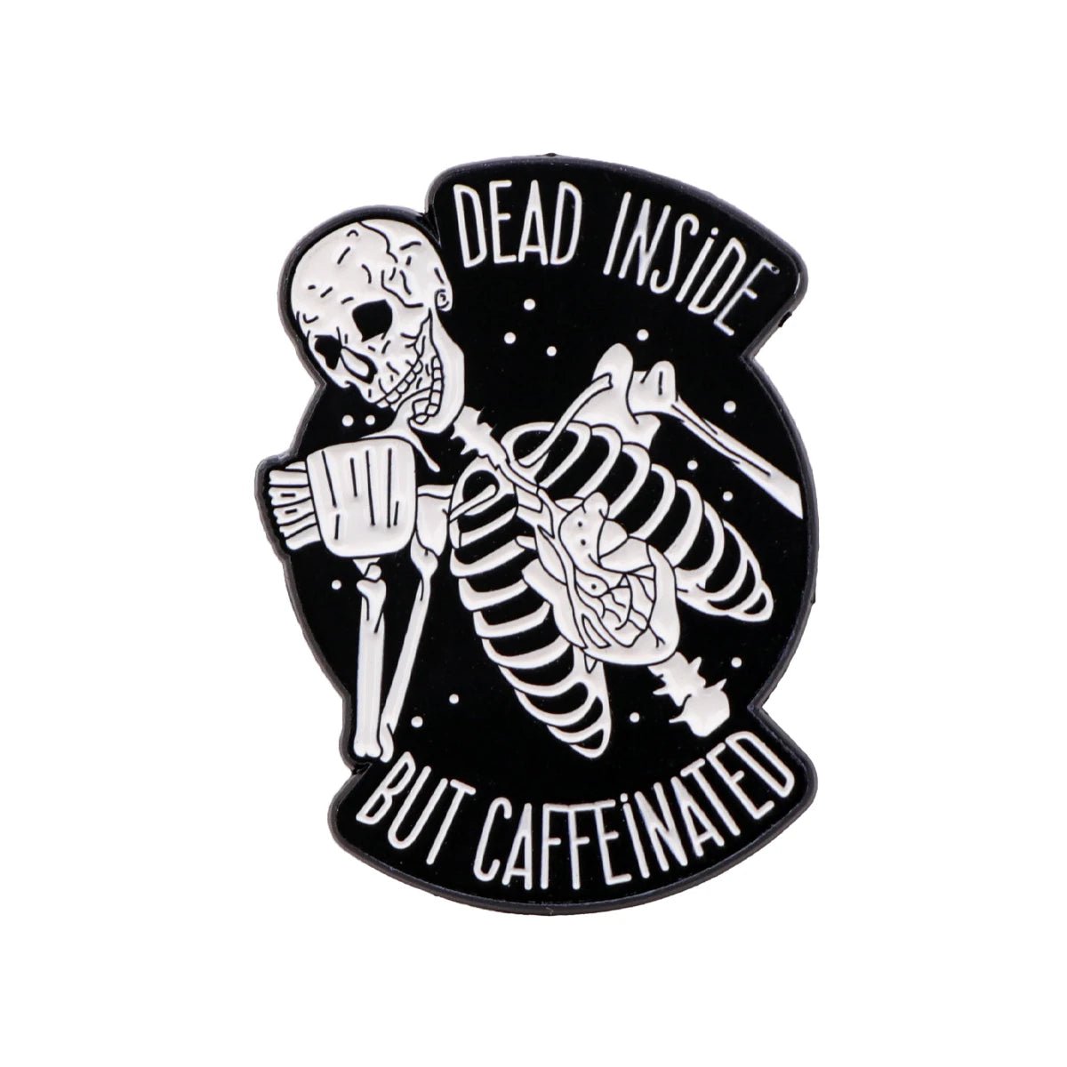 The Kiss Me Later enamel pin features a grinning skeleton holding a coffee mug on a black background with white stars. It reads DEAD INSIDE BUT CAFFEINATED—perfect for spooky vibes and coffee lovers!.
