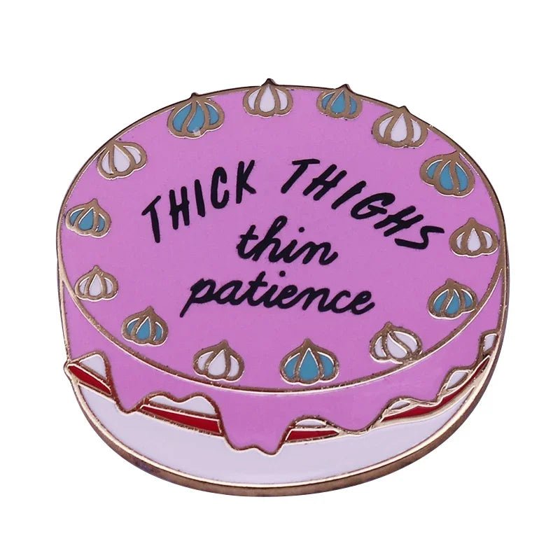TheMy Cutesy Era pink frosted vintage cake pin features blue and white decorations, black “THICK THIGHS thin patience” lettering—perfect for sassy style fans and enamel pin collectors.