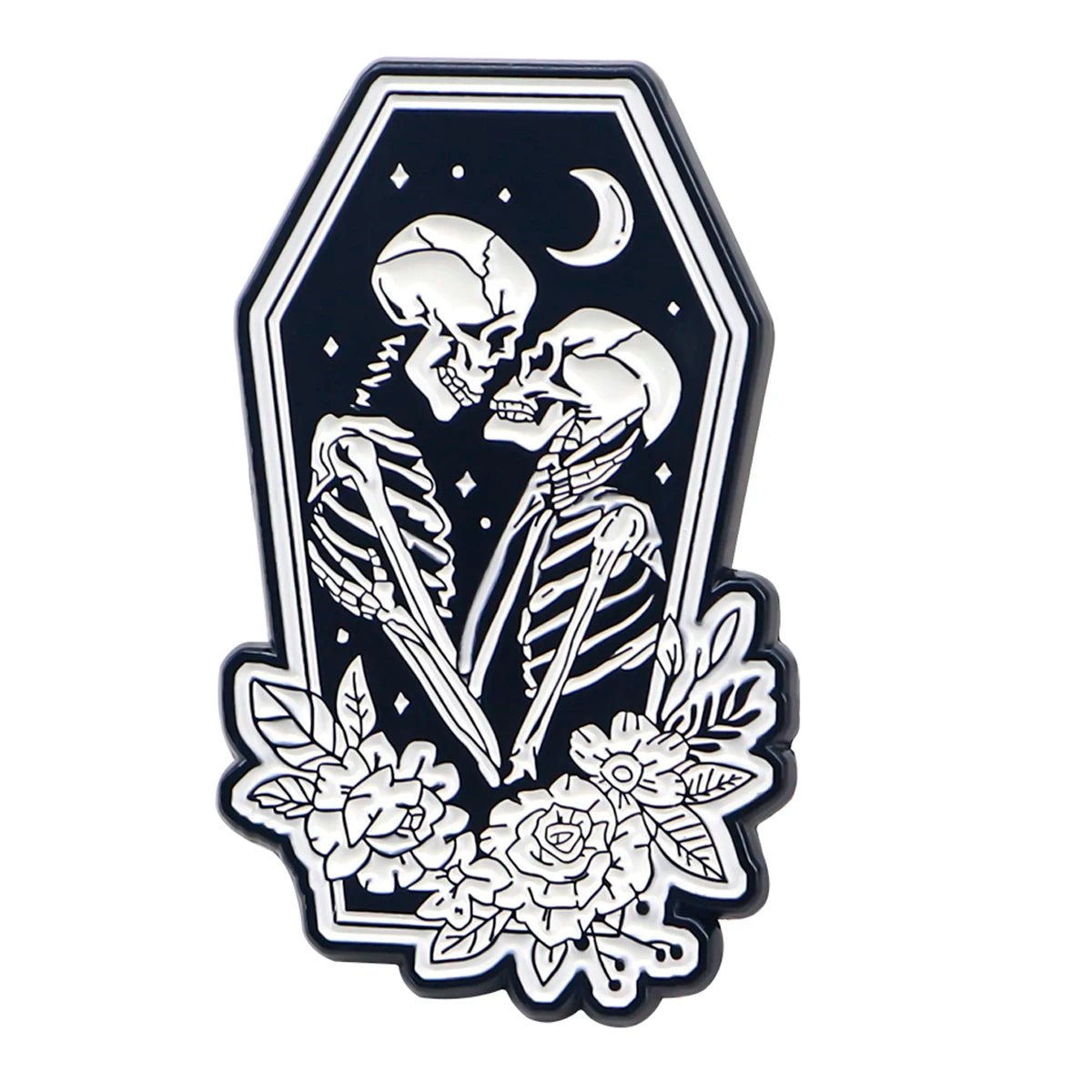 Kiss Me Later’s design features two skeletons facing each other in a coffin-shaped frame with a crescent moon, stars, flowers, and leaves, creating enchanting spooky vibes perfect for those who love unique gothic art.