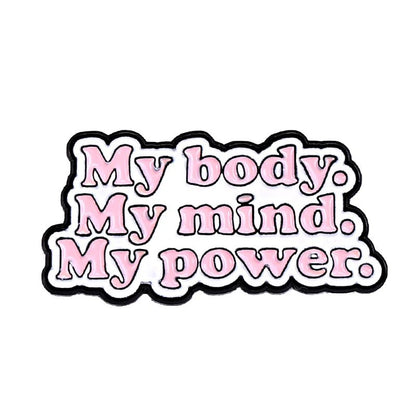 badge with bold pink text outlined in black reads “My body. My mind. My power.” on a white background—a stylish reminder of self-love and empowerment.