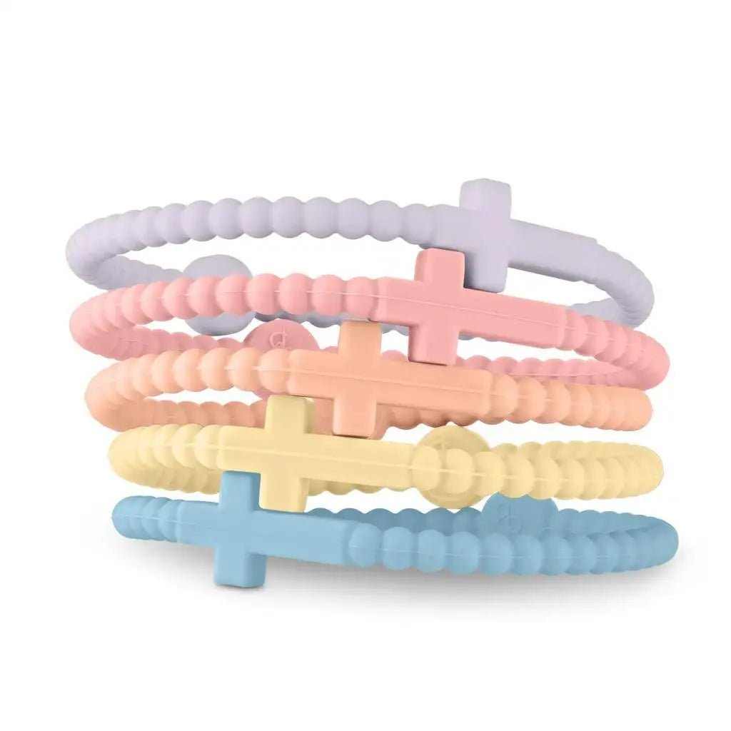 A set of five Kiss Me Later Cutie Bracelet silicone beaded bracelets in pastel purple, pink, orange, yellow, and blue—each with a cross-shaped central Jesus-inspired design.