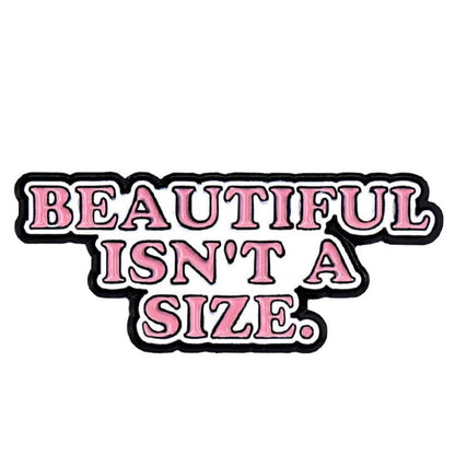 enamel pin or sticker featuring bold pink and black letters saying “Beautiful isn’t a size” on a white background—celebrate self-love with this empowering design.