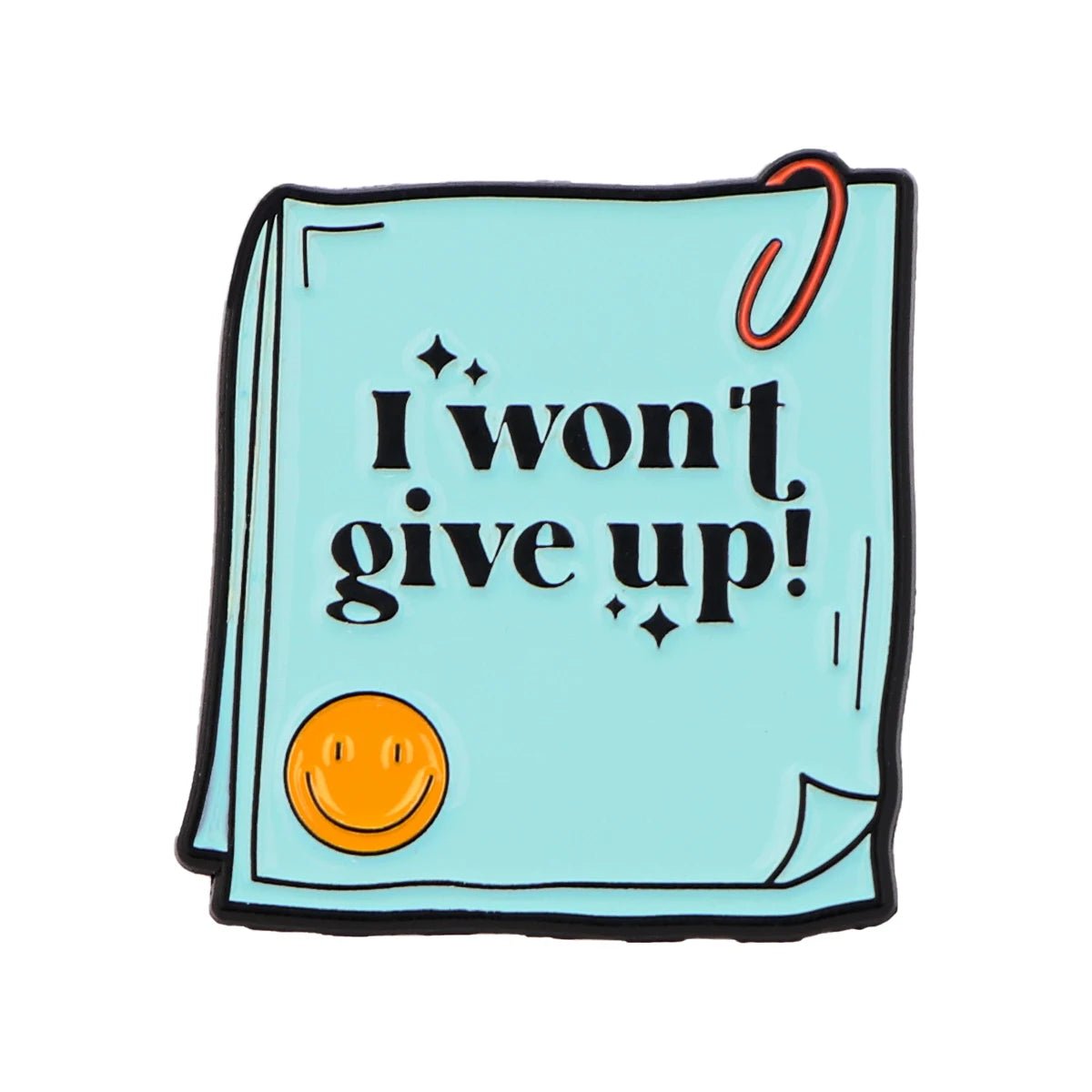 A blue sticky note accessory with a red paperclip, yellow smiley face sticker, bold black “I won’t give up!” text, and sparkles—perfect for self-empowerment and positive affirmations.