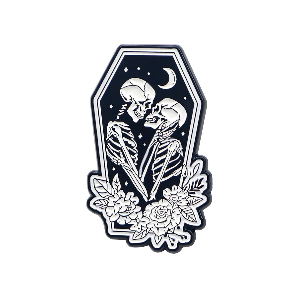 Two skeletons embrace inside a coffin-shaped frame, surrounded by roses, leaves, stars, and a crescent moon—perfect for fans of the Skeleton Lovers enamel pin.