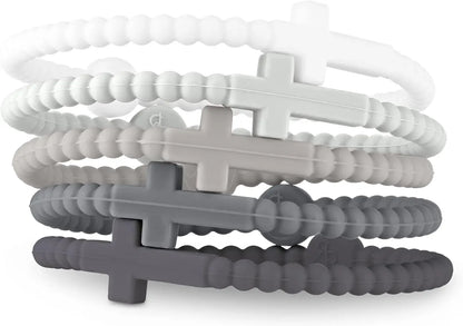 Five Kiss Me Later silicone Cutie Bracelets with cross charms, stacked in a gradient from white to dark gray. Each bracelet expresses faith stylishly, featuring a unique shade inspired by Jesus.