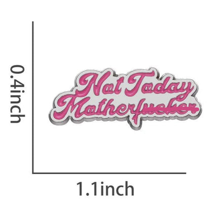 A small enamel pin by My Cutesy Era with pink cursive text reading Not Today Motherfucker. This Mean Girls-inspired pin measures 1.1 inches wide, 0.4 inches tall, and weighs just 3 grams—perfect for adding sass to any outfit.