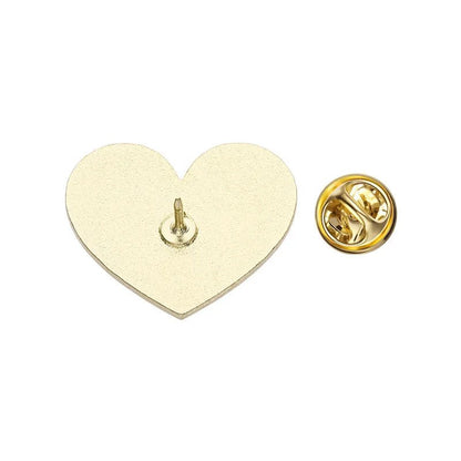 Gold heart-shaped lapel pin features a butterfly clutch backing and a smooth, flat surface that pairs well with red and gold enamel pins. Its centered post allows easy attachment to fabric.