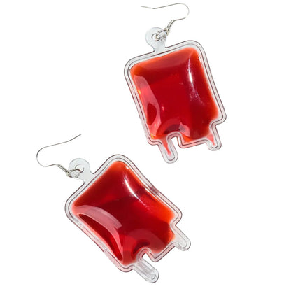 Red blood bag drop earrings. Halloween, horror, gore, emo, gothic fashion