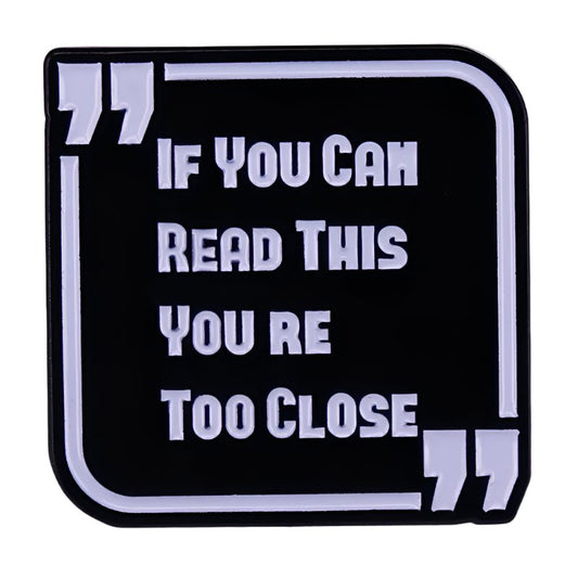 A black sign from My Cutesy Era with white text in quotes: If you can read this youre too close. Perfect for edgy decor fans, pairs well with a Hail Satan or pentagram pin.