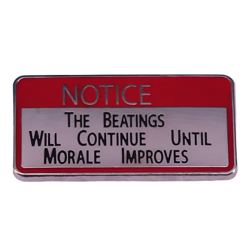 A rectangular My Cutesy Era sign with a red border reads: NOTICE. The beatings will continue until morale improves, and it comes accented by a Hail Satan enamel pin.