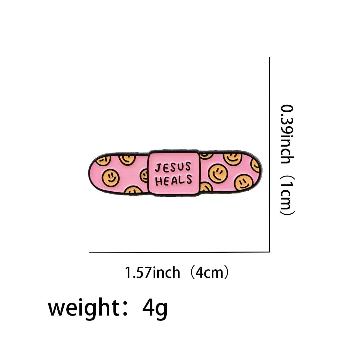 A cute enamel pin shaped like a pink bandaid, with yellow smiley faces and JESUS HEALS in the center. Measures 1.57 x 0.39 (4x1 cm) and weighs 4g.