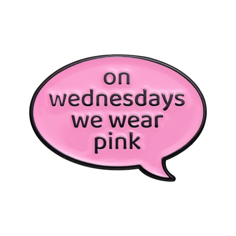 A pink speech bubble enamel pin by My Cutesy Era with On Wednesdays we wear pink in bold black letters—perfect for Mean Girls fans and enamel pin collectors.