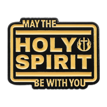 A black and gold May the Holy Spirit be with you pin featuring a cross with flames in the upper right corner of Holy.
