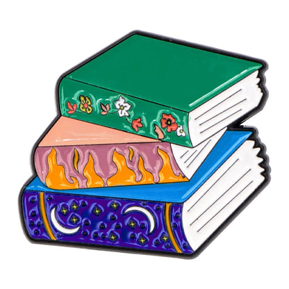 A stack of three illustrated books—a green floral, an orange flame, and a blue starry moon cover—perfect for any Booktrovert, each offering new fictional characters and inspiring adventures.