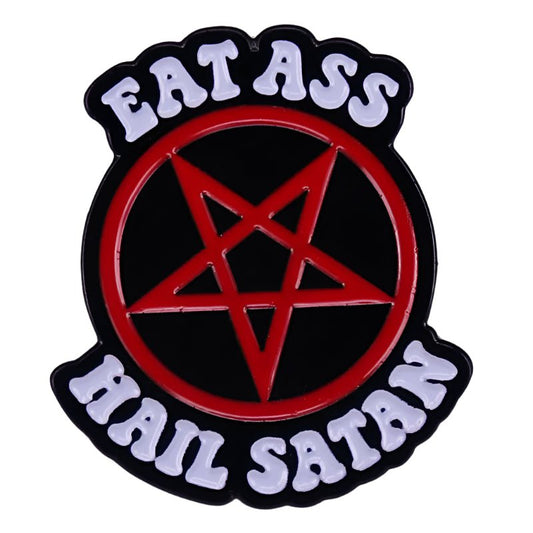 A bold enamel pin from My Cutesy Era featuring a red pentagram in a circle, white “EAT ASS” above, and “HAIL SATAN” below on black—a striking adult-content collector’s piece.