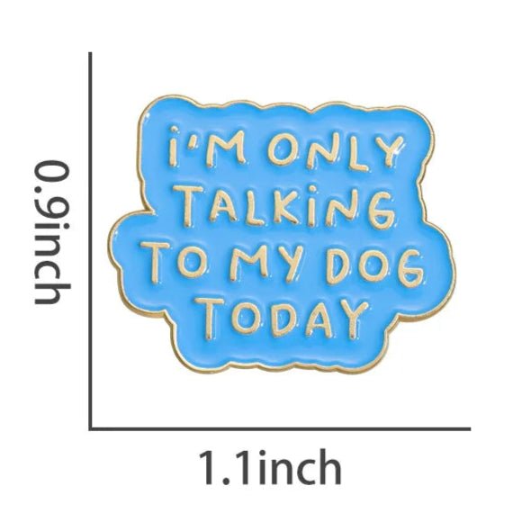 My Cutesy Eras blue dog enamel pin features yellow text, IM ONLY TALKING TO MY DOG TODAY, and measures 0.9 tall by 1.1 wide.