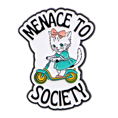 Illustration of a white kitten in a teal dress with a pink bow riding a green scooter, surrounded by bold MENACE TO SOCIETY text—fun inspiration for a cat enamel pin or Menace To Society pin 