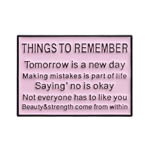 The My Cutesy Era pink enamel pin features black text reminders: Tomorrow is a new day, Mistakes are part of life, It’s okay to say no, Not everyone has to like you, and Beauty & strength come from within.