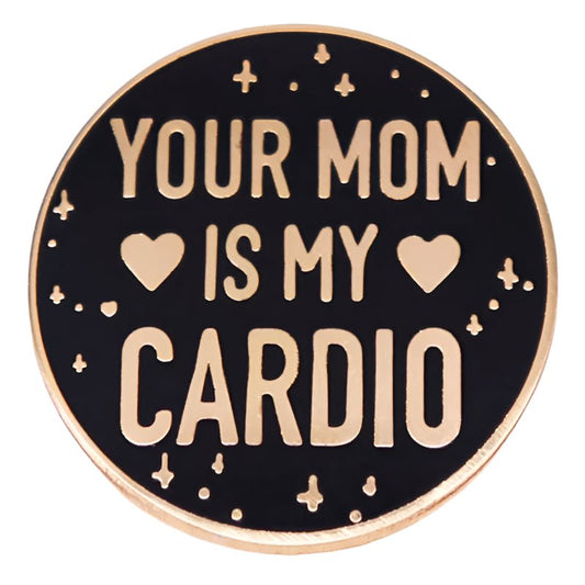 My Cutesy Era presents a black and gold enamel pin with “YOUR MOM IS MY CARDIO,” two hearts, and star accents on a round design.