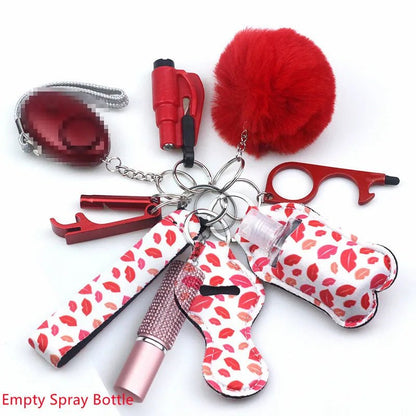 The Kiss Me Later keychain set includes a red pom-pom, safety alarm, pepper spray holder, lipstick, lip print holders, no-touch tool, bottle opener, and empty spray bottle—stylish personal safety accessories. Text reads Empty Spray Bottle.