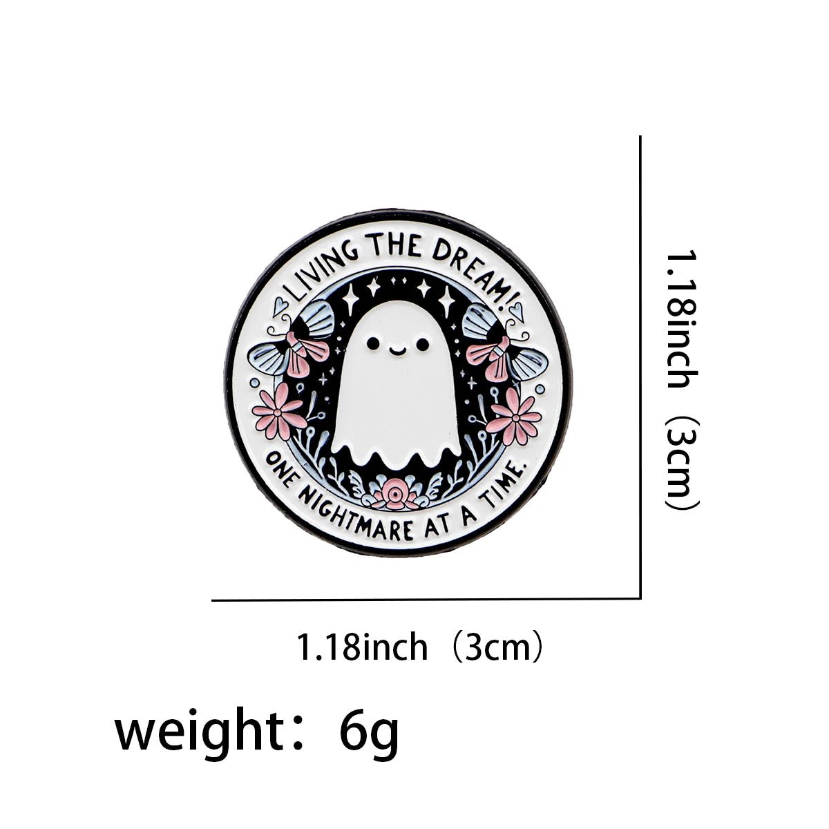 A round pin features a cute ghost with stars, flowers, and butterflies. Text says Living the dream, one nightmare at a time. The pin measures 1.18 inches (3 cm) wide and weighs 6 grams.