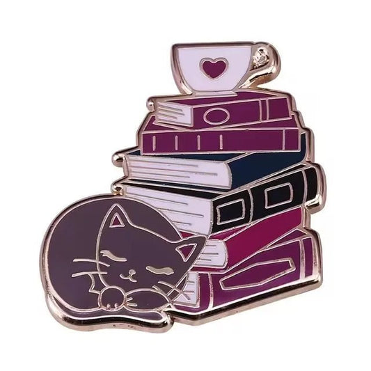 The My Cutesy Era enamel pin features a sleeping cat curled up next to a tall stack of books with a heart teacup on top, in soft purple, pink, and white—an adorable accessory for any book lover.