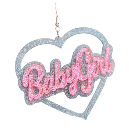 Heart-shaped earrings with 'Baby Girl' text in pink glitter 