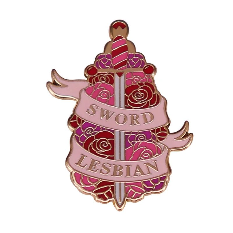 Enamel pin features a sword with a pink and red handle, surrounded by roses and a pink ribbon reading SWORD LESBIAN—perfect for any proud Sword Lesbian or bold book lover.