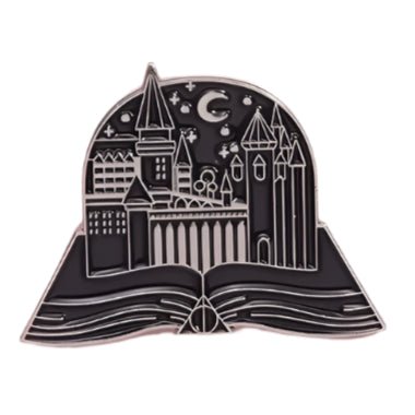 The My Cutesy Era black and silver enamel book pin features a stylized castle with towers and stars atop an open book—an ideal accessory for bookworms or a thoughtful gift for any book lover.