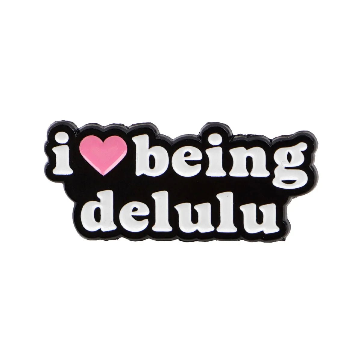 pin with i ♥ being delulu in white on black, the word love as a red heart enamel accent.