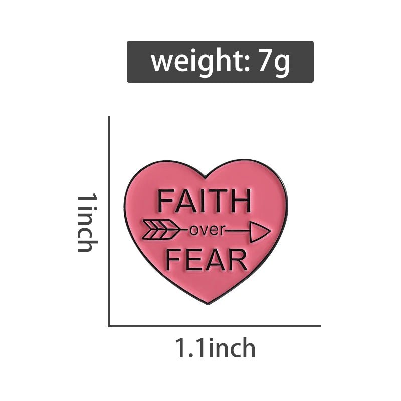 Red Pink love heart enamel pin features an arrow and Faith Over Fear in black text. Measuring 1 inch by 1.1 inches and weighing 7 grams, its a stylish and meaningful accessory.