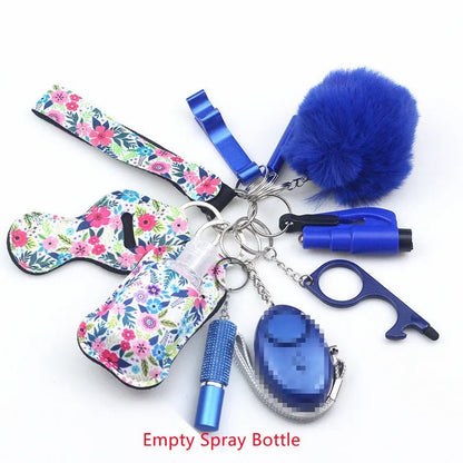 The Kiss Me Later keychain set features floral holders and safety accessories, including a blue pom-pom, whistle, alarm, no-touch tool, flashlight, and spray bottle—ideal for daily use or outdoor adventures.