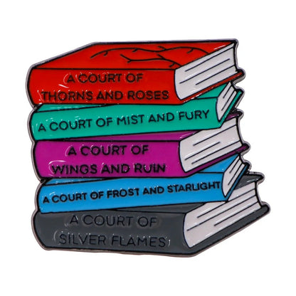 Add a splash of color to your look with an enamel pin—showcasing five ACOTAR-themed books. Perfect for any booktrovert or library lover who’s a fan of fictional worlds and the magic of reading.