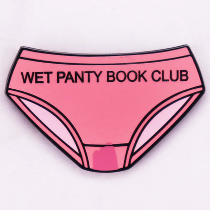pink enamel pin, shaped like women’s underwear and reading “WET PANTY BOOK CLUB,” is perfect for book club members or Wet Panty fans.