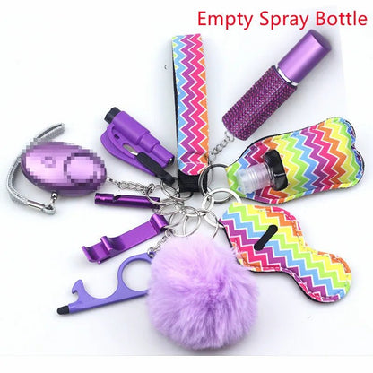 The Kiss Me Later keychain set features colorful zigzag-patterned personal safety accessories, including an empty spray bottle holder, purple pom-pom, bottle openers, lip balm holder, safety alarm, and contactless door opener.