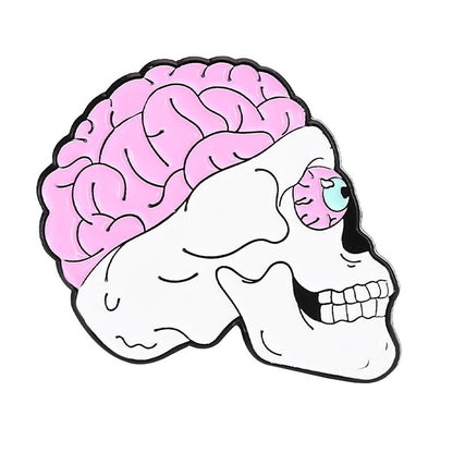 A stylized white skull enamel pin featuring a large pink brain, single blue eye, and profile view—perfect for adding unique flair.