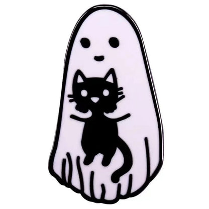 A cute pin shows a smiling ghost with two black eyes holding a wide-eyed, pointy-eared black cat, which sits on the ghost’s lower half. The illustration is on a plain white background.